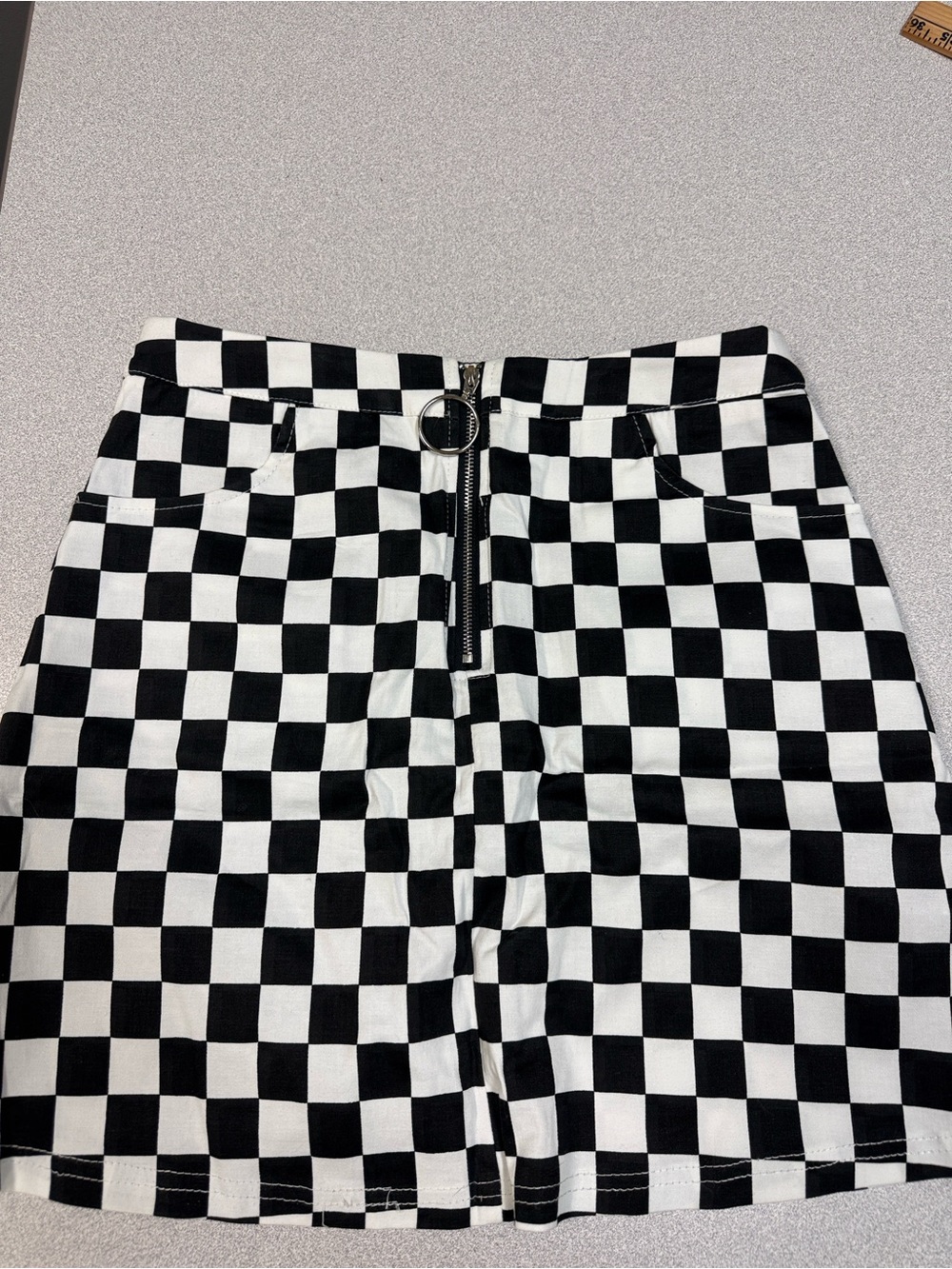 SHEIN Black and White Checkered Mini Skirt with Front Zip